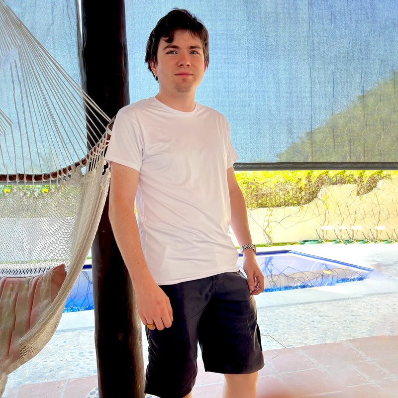 man wearing white sun protection tshirt