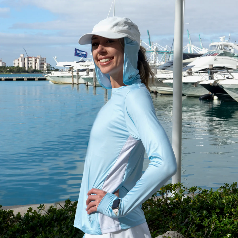 Woman enjoying a sunny day by the water wearing Belesun Sun Protection Shirt
